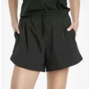 All in Motion High Rise black shorts, NWT women’s XL 100% nylon, side pockets.